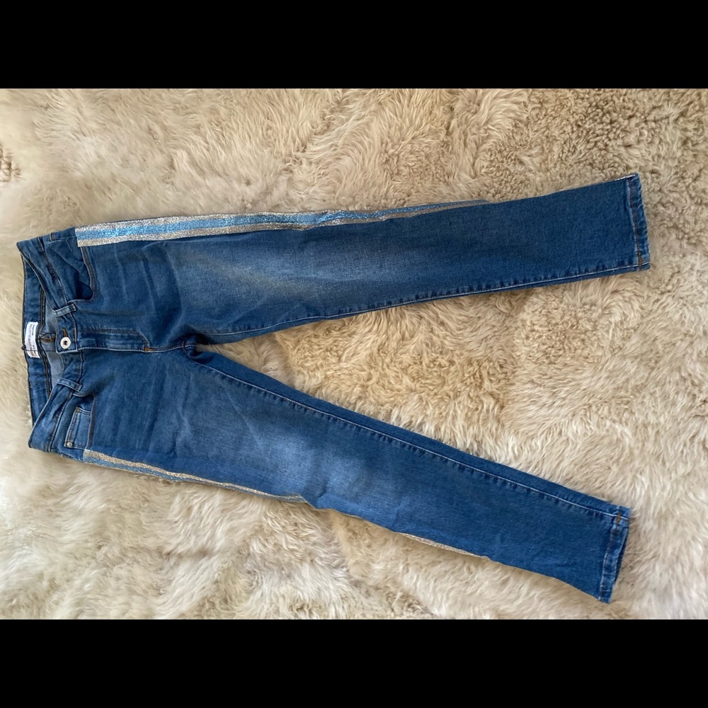 Girls blue jeans with sparkle stripes on side